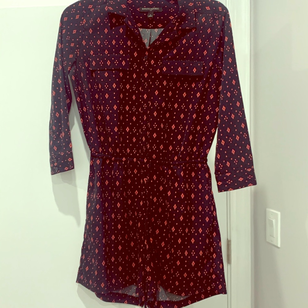 Navy quarter length romper with waist tie